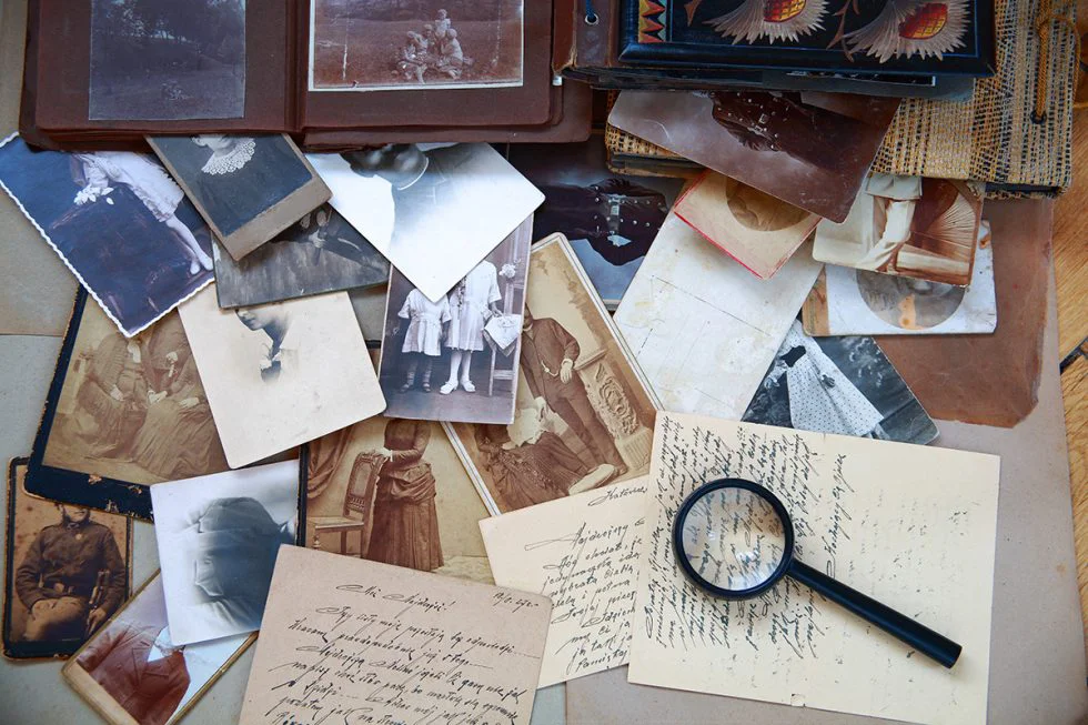 Family keepsakes, letters, and photo albums prepared for digital preservation
